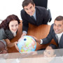 5 people holding globe